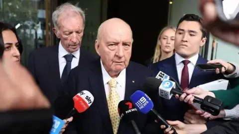 Sex Abuse Charges Against Leading Aussie Broadcaster Lessened